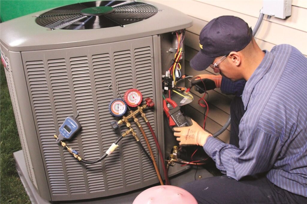 AC Technician repairing central air conditioner